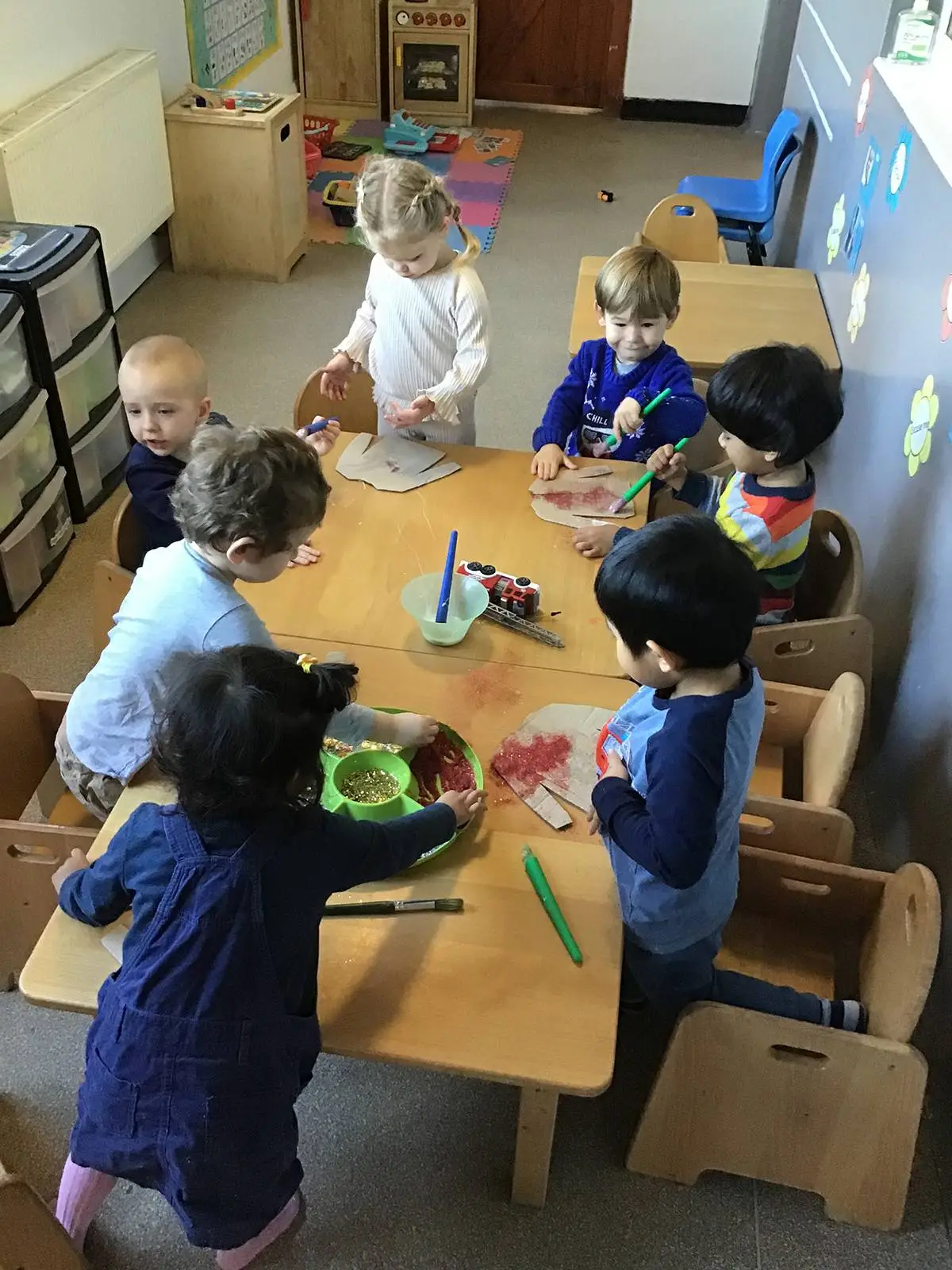 Children exploring at Clever Cloggs Nursery in Welling