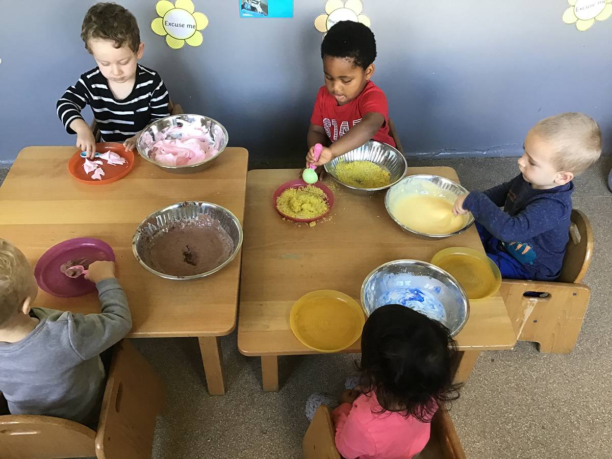 Children enjoying a meal at the nursery