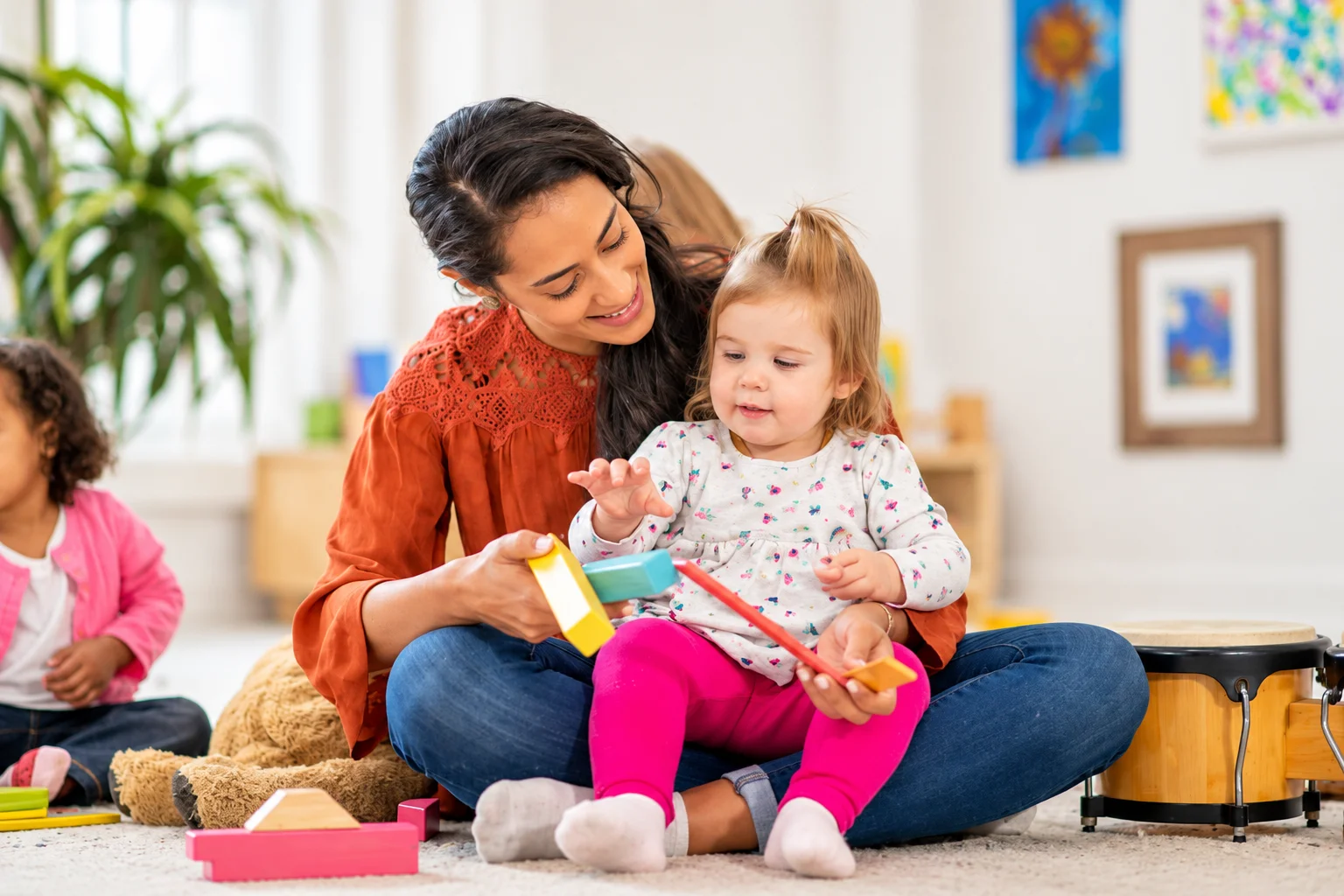 Key person supporting a child at Clever Cloggs Nursery in Welling