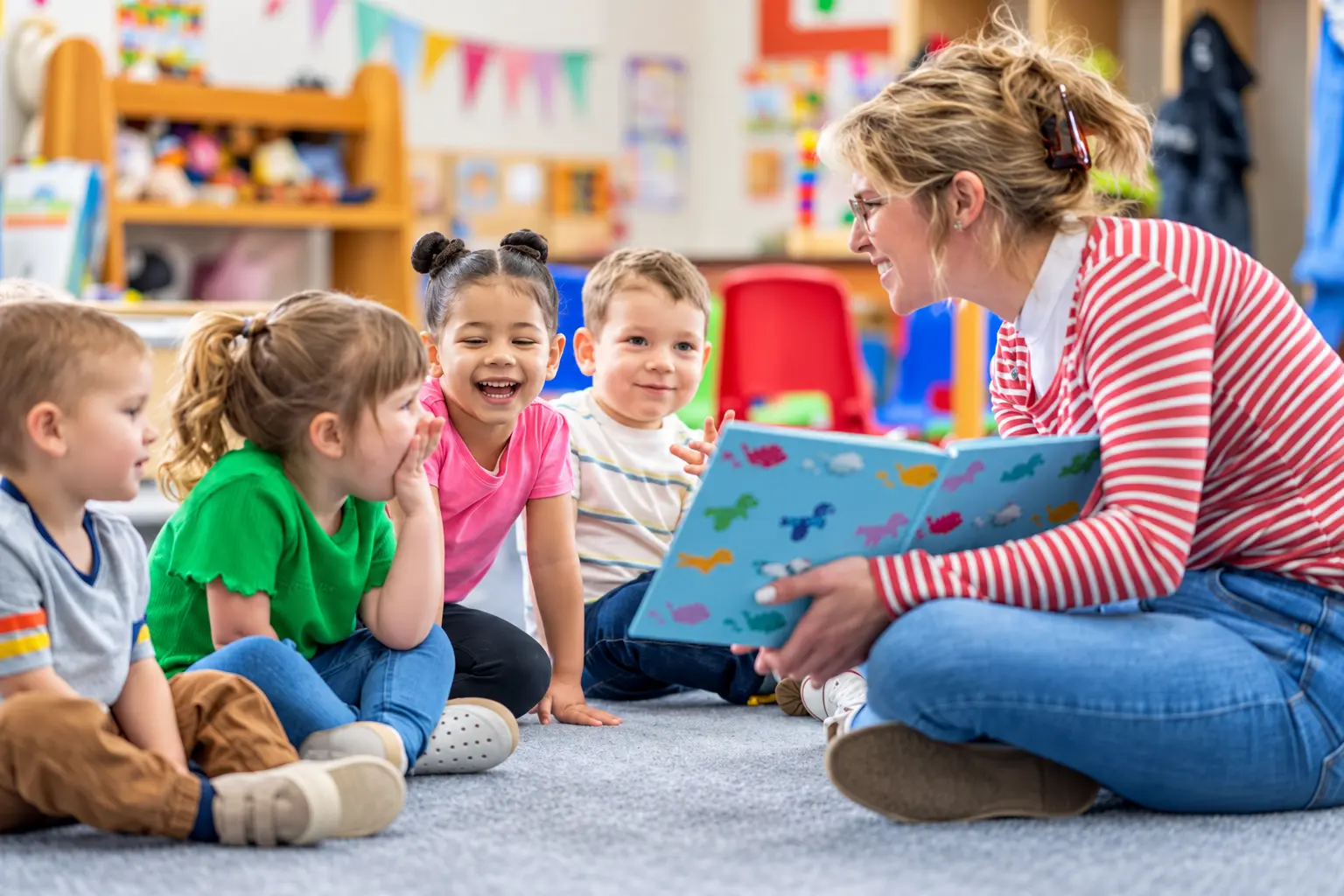 Children sharing a nursery activity at Clever Cloggs